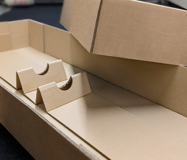 Cardboard box with bespoke fittings