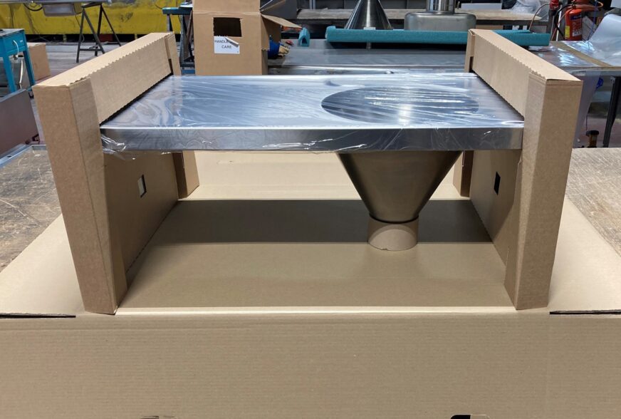 A bespoke packaging solution for a Pland Stainless sluice sink. The end caps are secured around the slop hopper body.